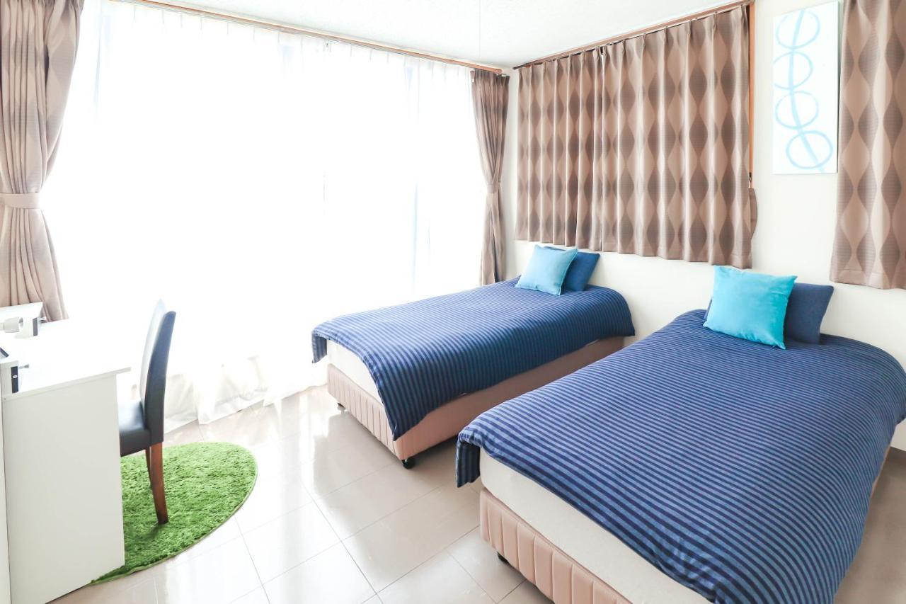 Condominium Hotel Mihama Upi Chatan Esterno foto