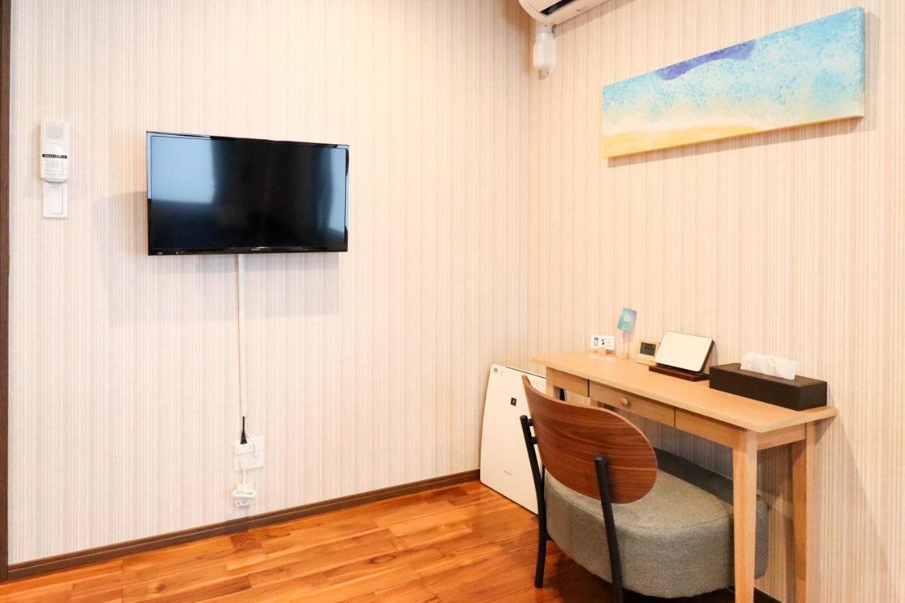 Condominium Hotel Mihama Upi Chatan Esterno foto