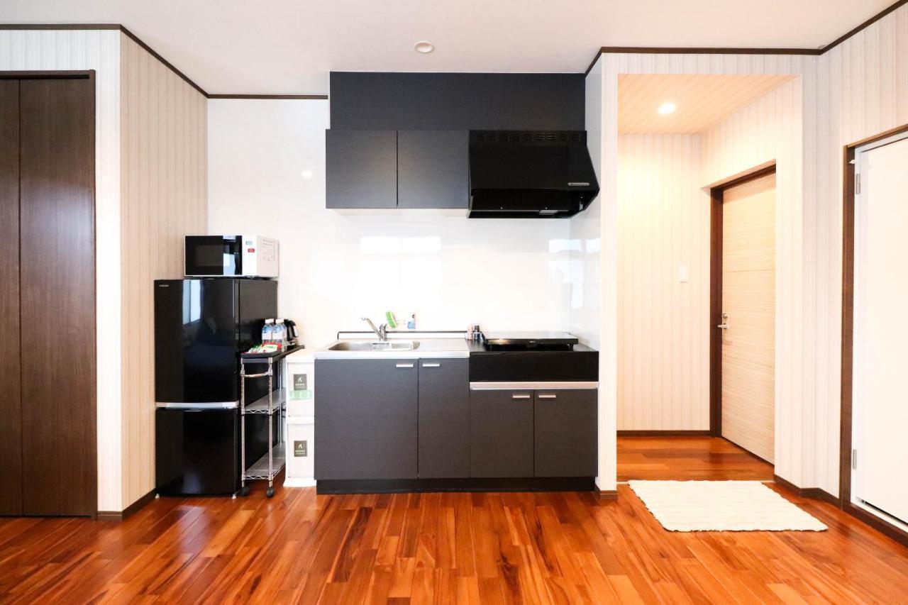 Condominium Hotel Mihama Upi Chatan Esterno foto